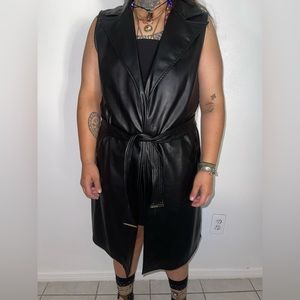 Sleeveless faux leather trench